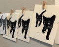 two black cats linocut print